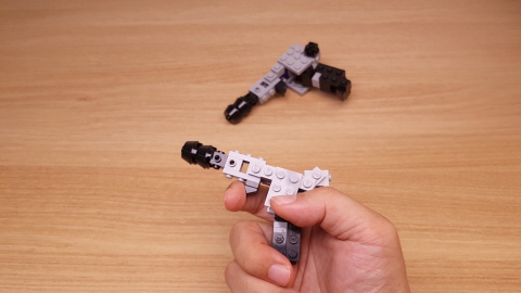 Micro LEGO brick gun transformer mech - Black Trigger
 1 - transformation,transformer,LEGO transformer